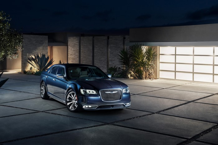 Blue 2015 Chrysler 300 C parked at night