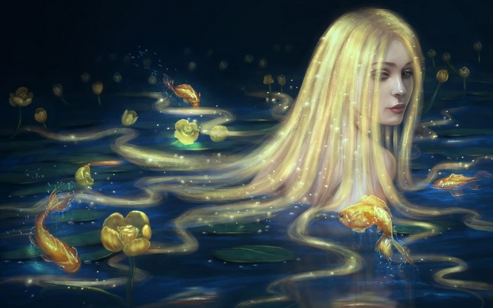Woman with long blonde hair in a pond with goldfish