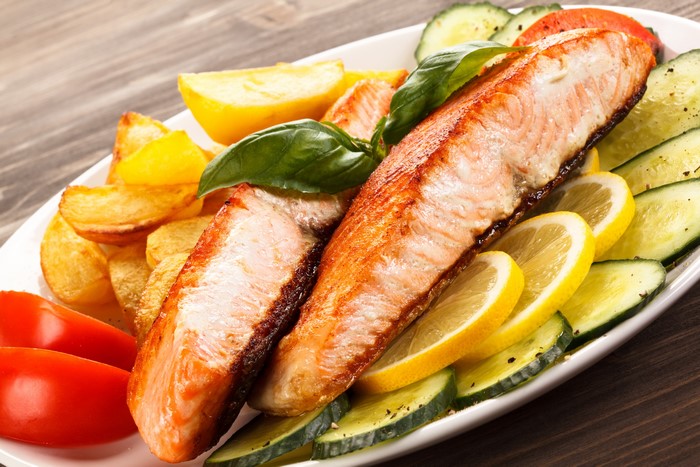Salmon with Potatoes, Lemon, Cucumber, and Tomato
