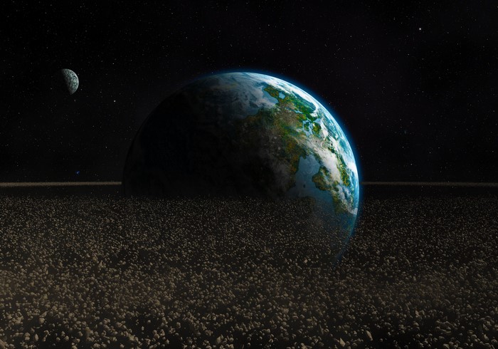 Planet with rings and moon in space