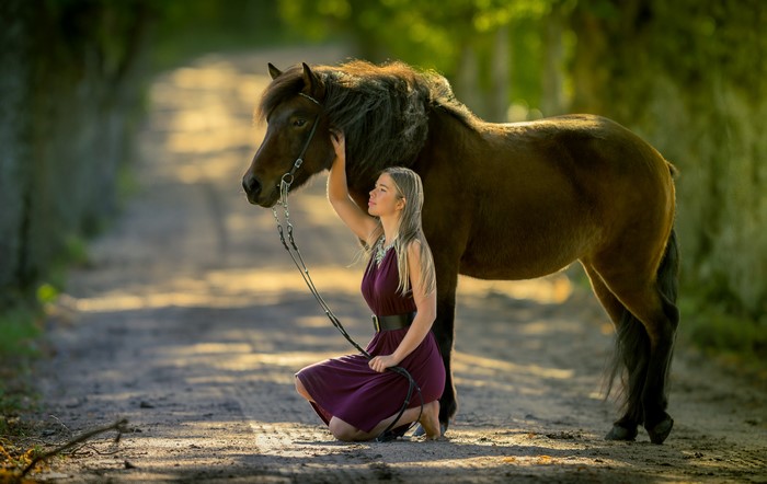 Girl with Horse on a Road