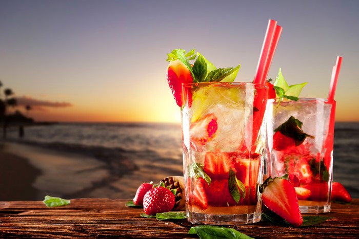Strawberry Drinks on a Beach at Sunset