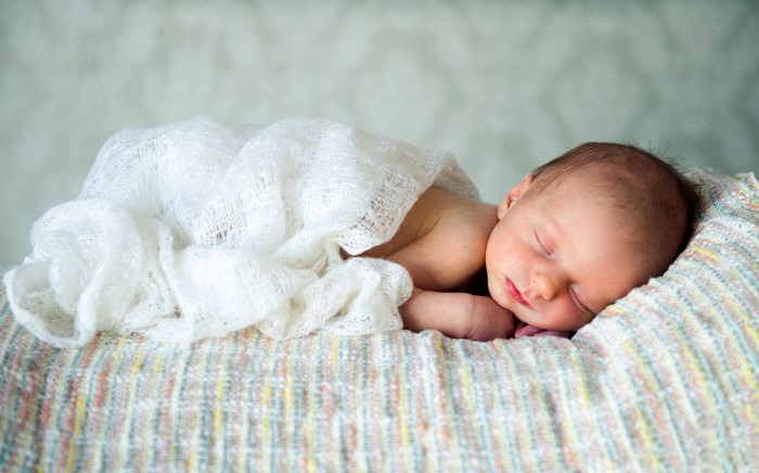 Newborn baby sleeping peacefully