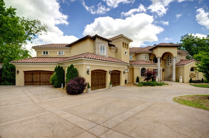Luxury Mediterranean Mansion with Multiple Garage Bays