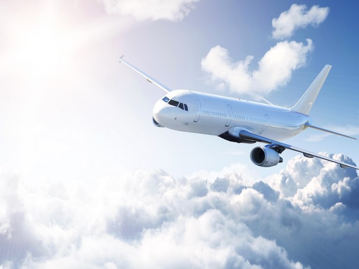 Airplane flying through clouds