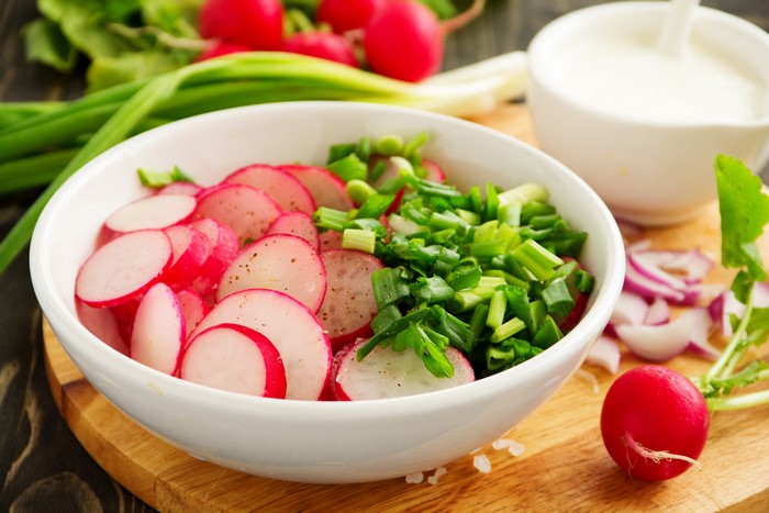 Radish and green onion salad with sour cream