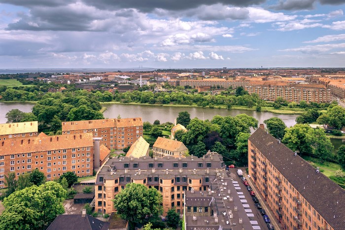 Aerial view of Copenhagen with buildings and a lake