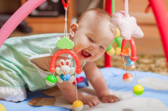 Baby playing with toys