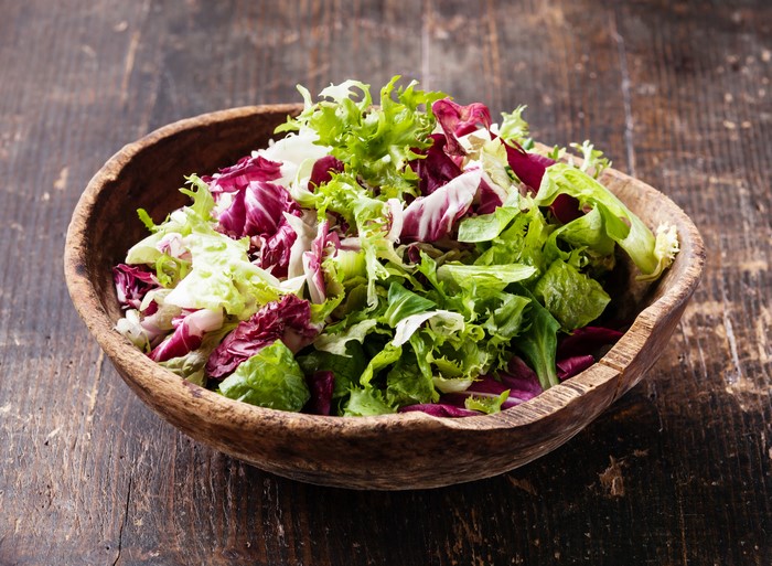 Salad in a wooden bowl