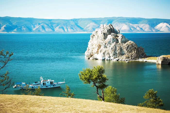 4K Baikal Lake Scenery with Rock Formation and Boat