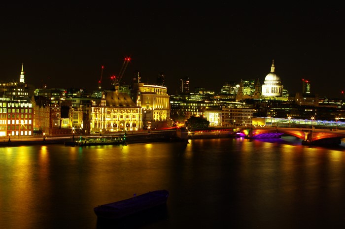 London skyline at night with River Thames and St Paul's Cathedral