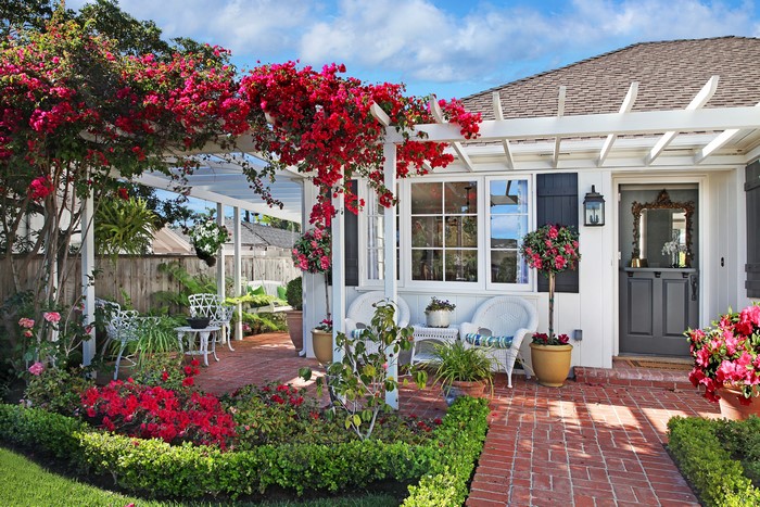 House with Bougainvillea and Outdoor Seating Area