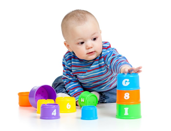 Baby playing with stacking cups