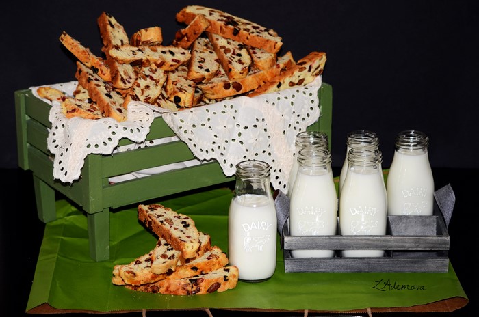 Biscotti and milk bottles in a rustic display