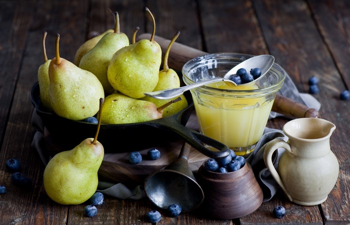 Pears, Blueberries, and Honey on a Wooden Table