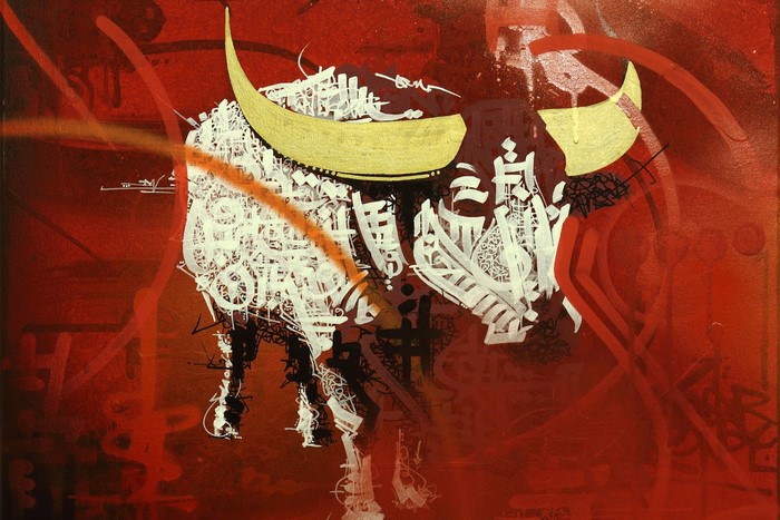 Abstract painting of a bull with golden horns