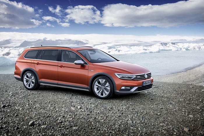 Orange 2015 Volkswagen Passat Alltrack on rocky shore