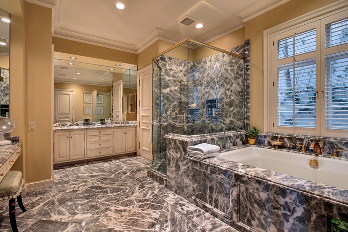 Luxury marble bathroom with shower and bathtub