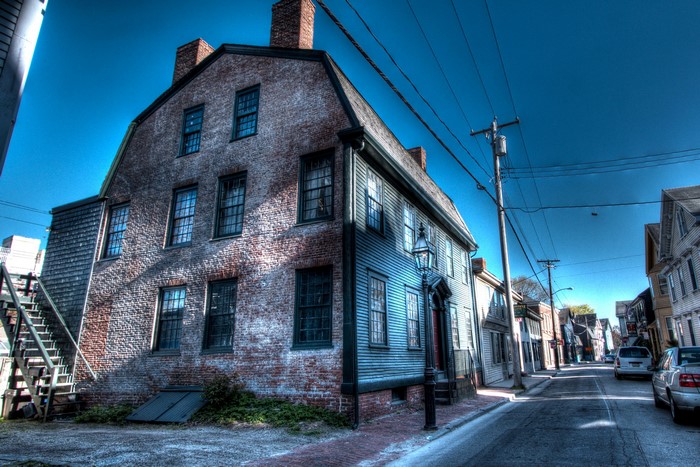 Historic Brick and Wood Houses on a Street in Newport, USA