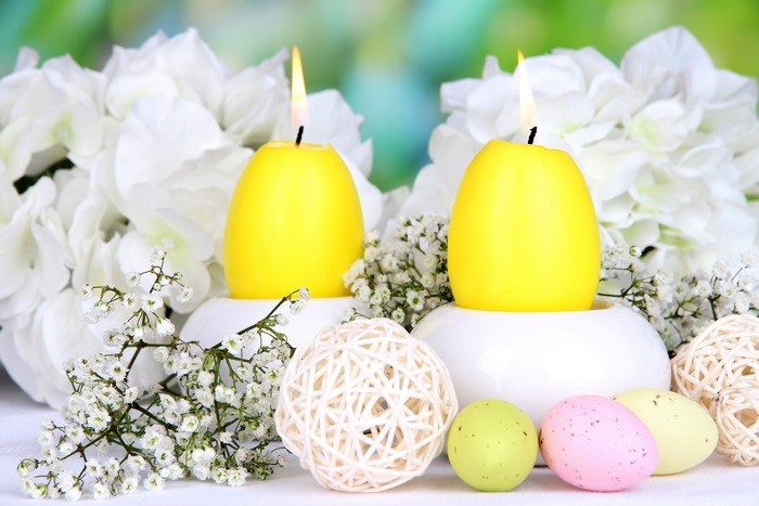 Easter Candles and Eggs with White Flowers