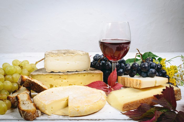 Cheese, Grapes, and Red Wine with Stemware