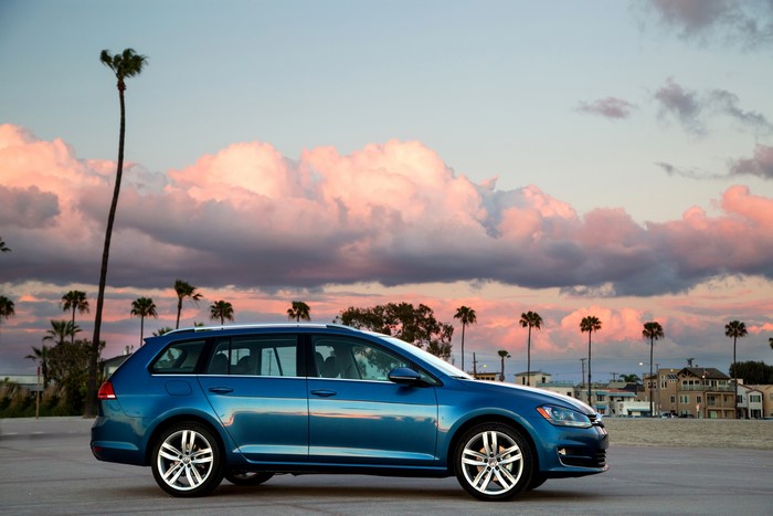 Blue 2015 Volkswagen Golf SportWagen at sunset