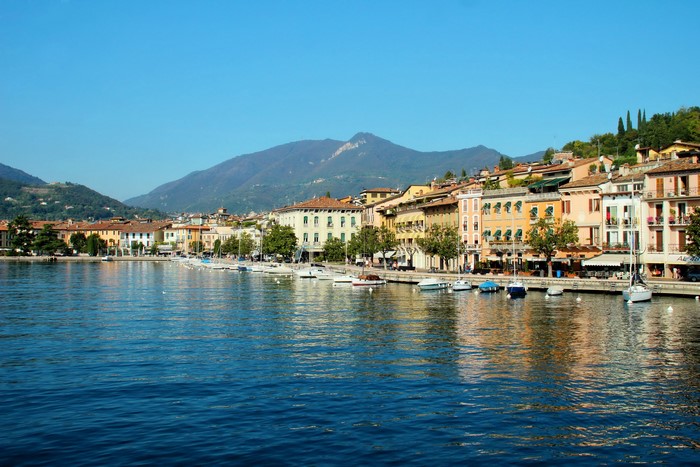 Salo Lombardy Italy waterfront with boats and mountains