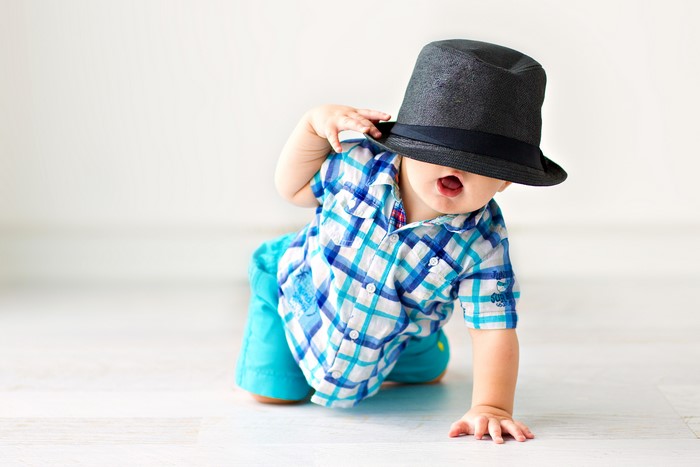 Baby boy in a hat and shirt