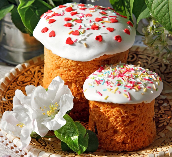 Easter Kulich Pastries with Icing and Sprinkles