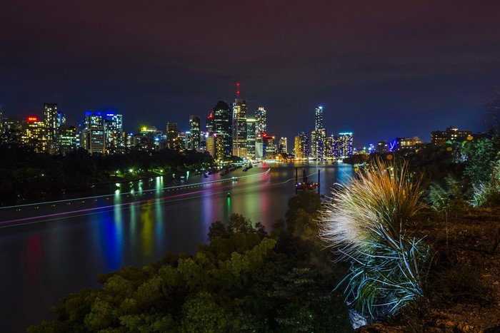 Brisbane skyline at night with river