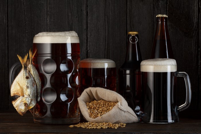 Beer Mugs and Bottles with Dried Fish and Grains