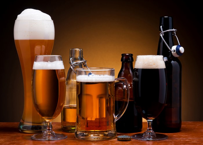 Beer bottles and glasses with beer