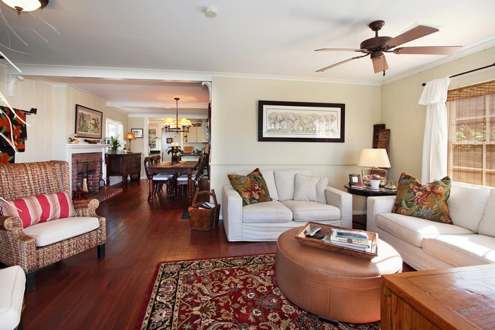 Living room with fireplace and dining area