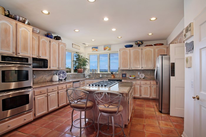 Kitchen with island and ocean view