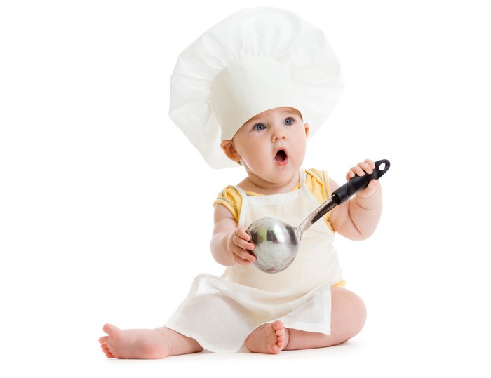 Baby in chef hat holding ladle