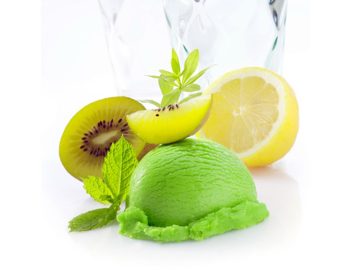 Green ice cream scoop with kiwi and lemon
