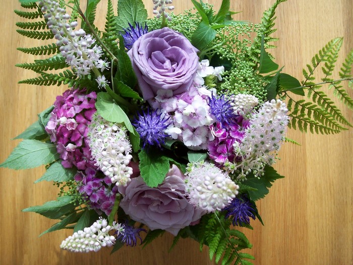 Purple and pink floral bouquet with ferns