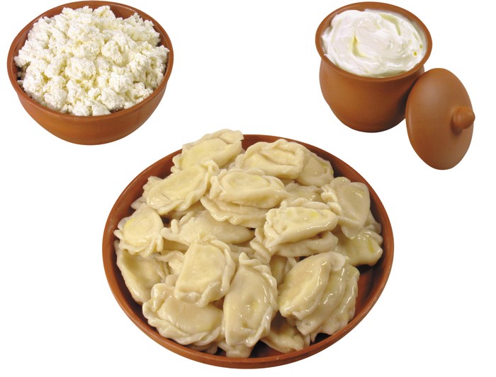 Pierogi varenyky with cottage cheese and sour cream