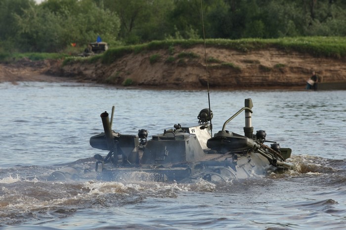 Amphibious IFV crossing a river