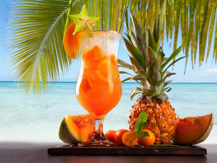 Tropical Cocktail with Fruits and Palm Tree