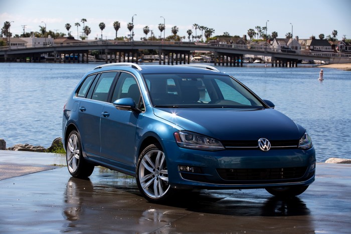Blue 2015 Volkswagen Golf SportWagen by a body of water