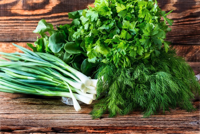 Scallions, Dill, and Parsley on Wood