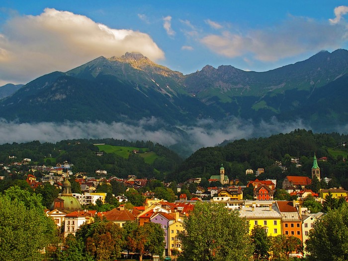 Innsbruck, Austria with Mountains and Houses