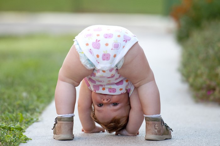 Adorable Infant Playing Outdoors in Boots 4K