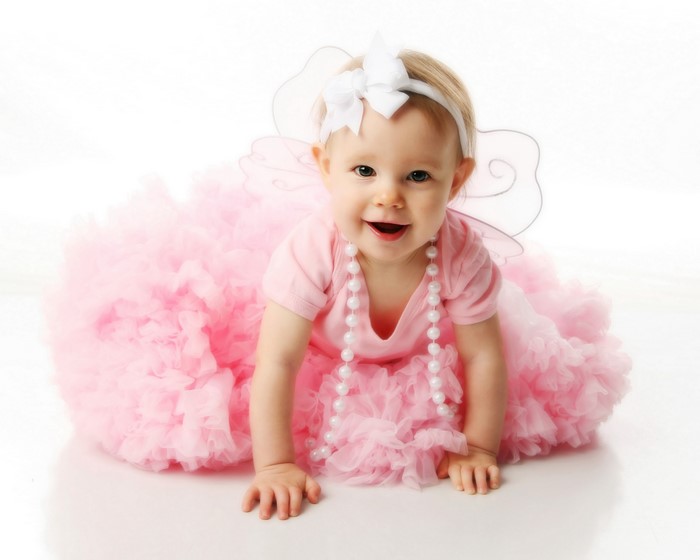 Baby girl in pink tutu and pearls