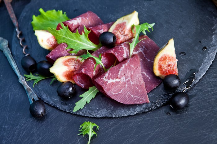 Thinly Sliced Cured Meat with Figs and Olives