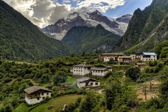 Yubeng Village in Yunnan, China with Snow-Capped Mountains