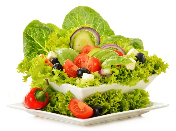 Salad with tomatoes, olives, feta, and lettuce