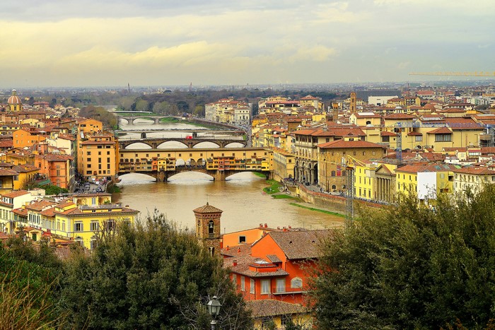 Florence cityscape with Ponte Vecchio bridge over Arno River