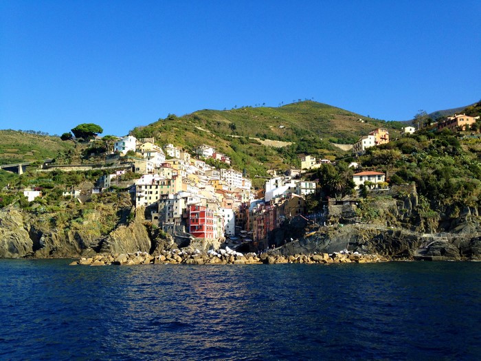 Colorful houses on a cliffside overlooking the sea